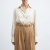 Generated with Kive.ai - need photo to sell those belts_ frame from the neck to the tighs. minimalist outfit in earth colours_ but no green_ made of luxury fabrics like wool silk_ outfits more for spring summer than autumn winter. white (1).png