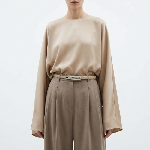Generated with Kive.ai - need photo to sell those belts_ frame from the neck to the tighs. minimalist outfit in earth colours_ but no green_ made of luxury fabrics like wool silk_ outfits more for spring summer than autumn winter. white (2).png