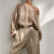 Generated with Kive.ai - need photo to sell those belts_ frame from the neck to the tighs. minimalist outfit in earth colours_ but no green_ made of luxury fabrics like wool silk_ outfits more for spring summer than autumn winter. white (4).png