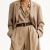 Generated with Kive.ai - need photo to sell those belts_ frame from the neck to the tighs. minimalist outfit in earth colours_ but no green_ made of luxury fabrics like wool silk_ outfits more for spring summer than autumn winter. white (5).png